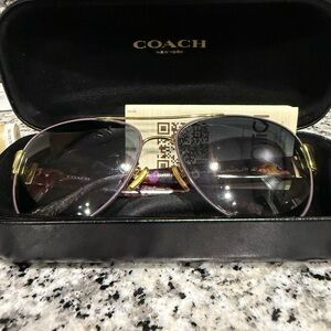 Purple and Gold Coach L138 Sunglasses. Grey to purple gradient lens.